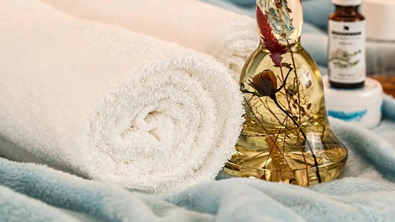 Elegant slider image featuring a selection of luxury SPA oils at Dome Spa in Dubai, displayed against a backdrop of serene spa ambiance, ready to enhance the massage and relaxation experience.