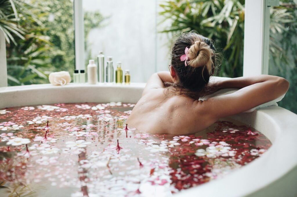 "Suggestion emphasizing the importance of hydration, particularly in Dubai's hot climate. Recommends drinking plenty of water or enjoying a detoxifying beverage like lemon and mint-infused water. The passage also advises including light and healthy snacks like fresh fruits or nuts to maintain energy levels during the spa experience."