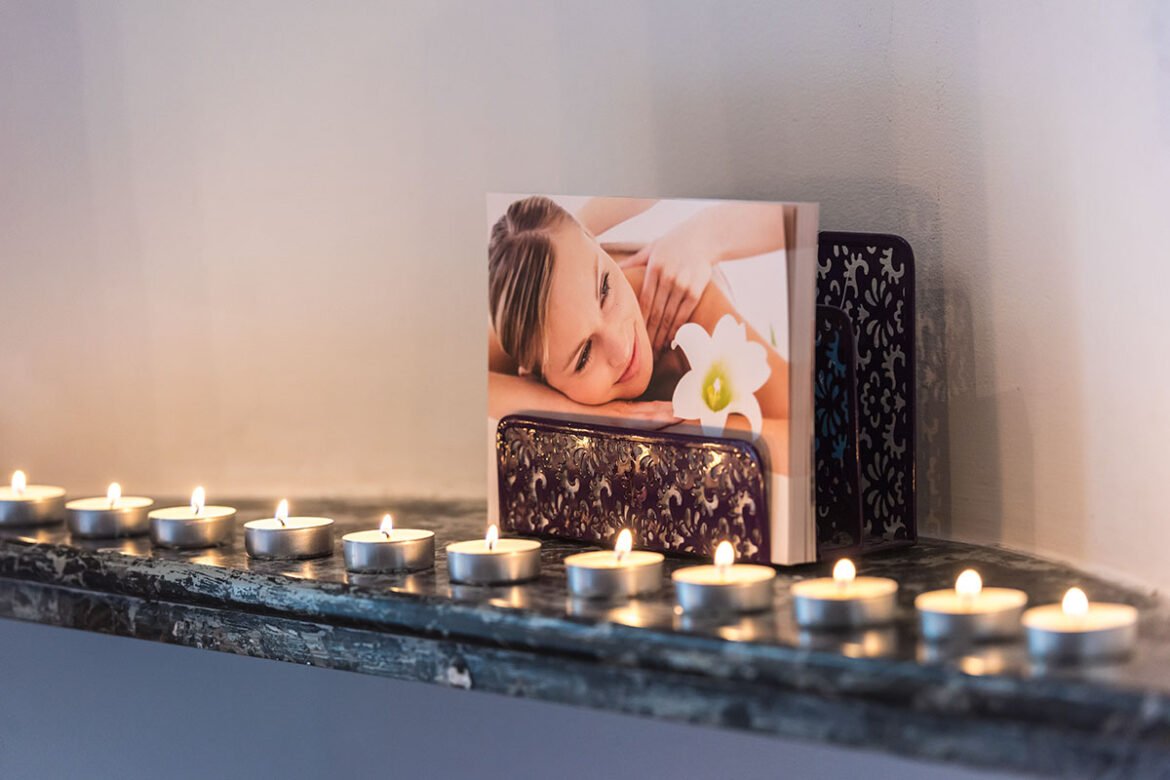 Relaxing home spa ambiance with candles and massage setup by Domy Beauty in Dubai