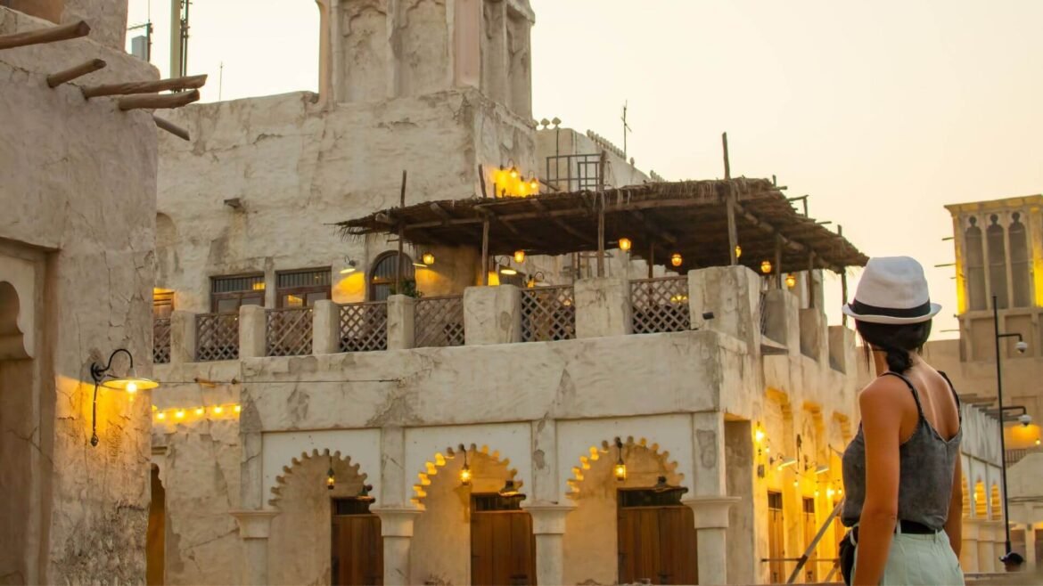 Historic neighborhood in Dubai at sunset showcasing traditional architecture and cultural heritage