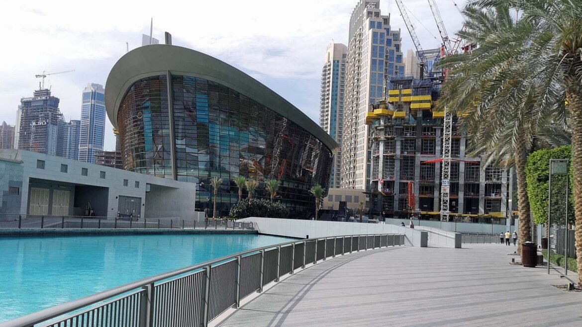 Dubai Opera district with waterfront walkway near spa and wellness centers in Downtown Dubai